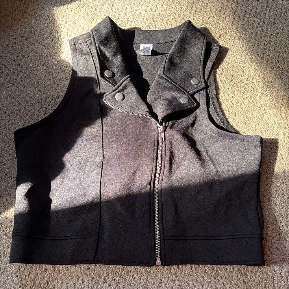 All black zip up vest with silver buttons